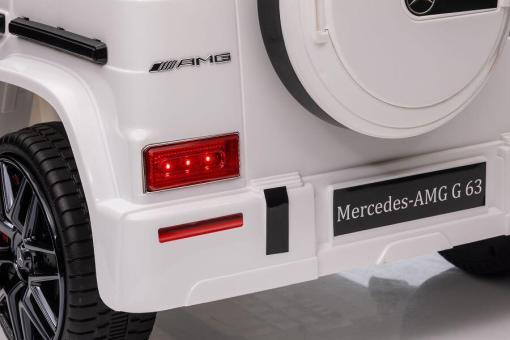 Elektro Kinderauto "Mercedes G63 AMG" - Lizenziert - 12V Akku,2 Motoren- 2,4Ghz Fernsteuerung, MP3+Ledersitz+EVA-Weiss – Bild 11